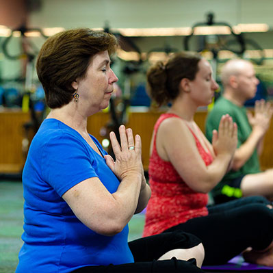Women participating in a yoga class.